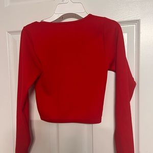 Red v-Neck top. Not worn